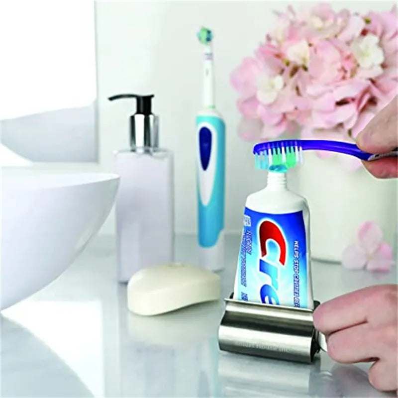 Accesorios de baño exprimidor de pasta de dientes, rodillo de tubo de acero inoxidable, dispensador giratorio para ungüentos y cosméticos