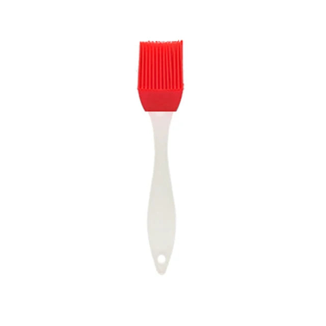 Brosse à huile en silicone avec manche en plastique pour barbecue et pâtisserie, résistante aux hautes températures.