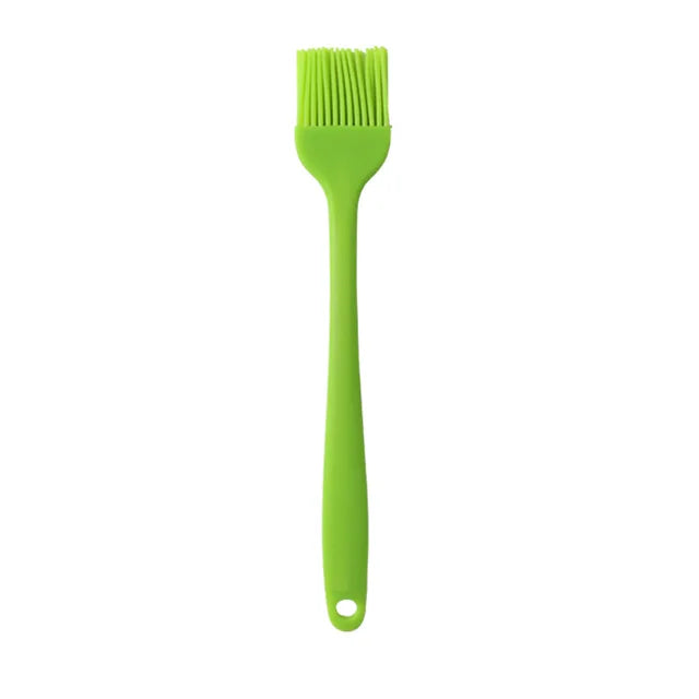 Brosse à huile en silicone avec manche en plastique pour barbecue et pâtisserie, résistante aux hautes températures.