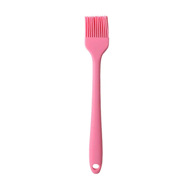 Brosse à huile en silicone avec manche en plastique pour barbecue et pâtisserie, résistante aux hautes températures.