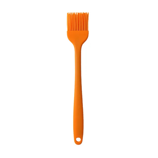 Brosse à huile en silicone avec manche en plastique pour barbecue et pâtisserie, résistante aux hautes températures.