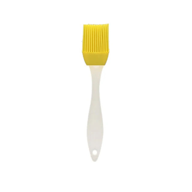 Brosse à huile en silicone avec manche en plastique pour barbecue et pâtisserie, résistante aux hautes températures.