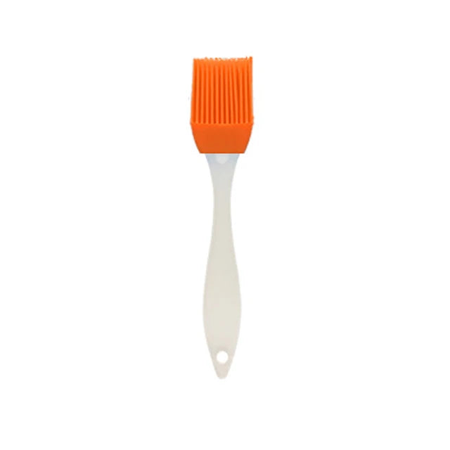 Brosse à huile en silicone avec manche en plastique pour barbecue et pâtisserie, résistante aux hautes températures.